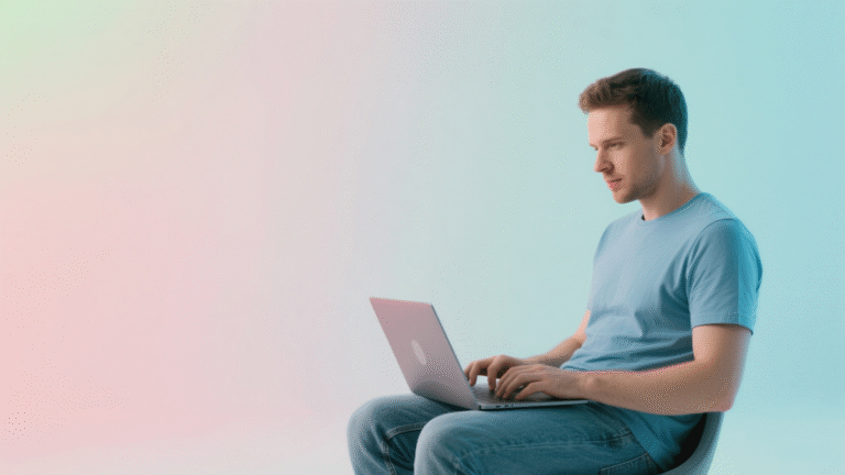 man typing on laptop